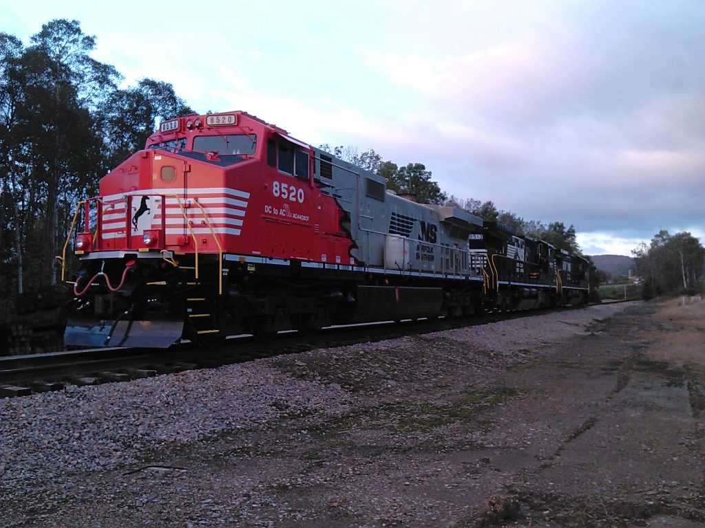 Sunset photo of Rudolph the Red Nosed locomotive Norfolk Southern DC2AC project 