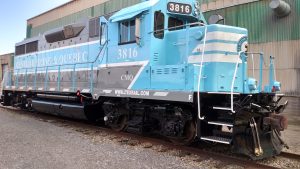 aqua coloured locomotive from Quebec, made by Larry's Truck and Electric