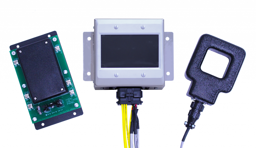 Three tech items, a square green circuit board is for measuring voltage, the touch screen is to view megawatt hour data, and the square current sensor is for measure current